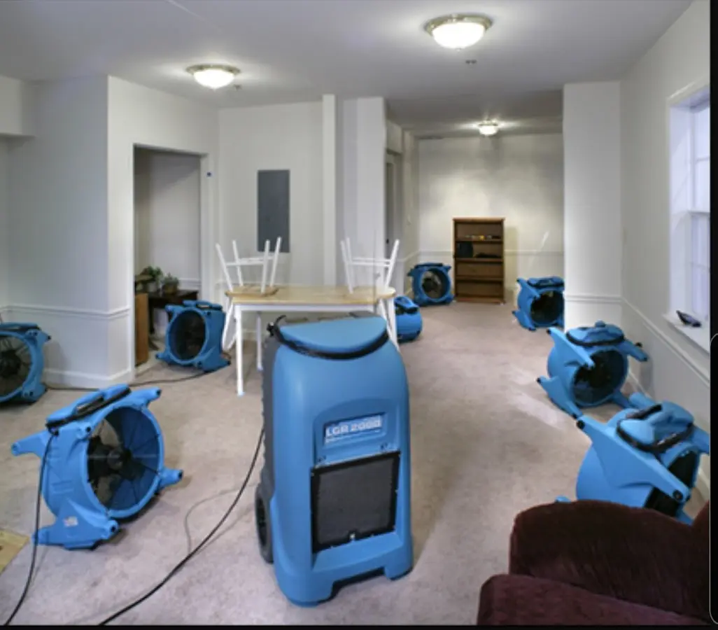 Air movers and dehumidifier setup for Water Damage Restoration in Waipio